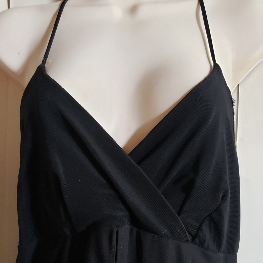 Black evening dress with ruffled see thru skirt